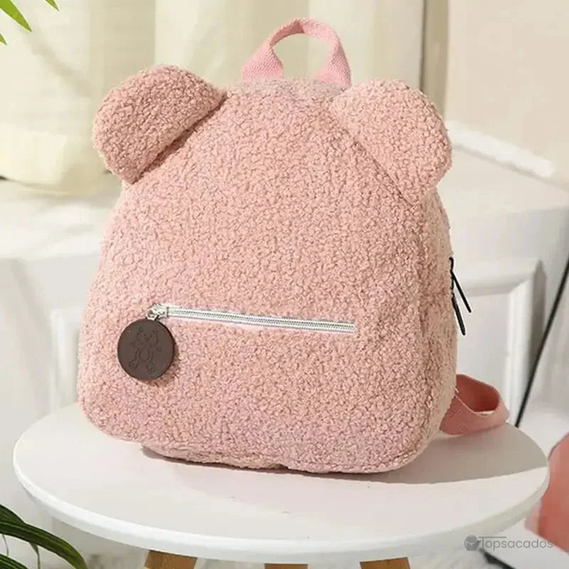 Sac a dos college Ourson rose poudré en tissu effet peluche avec oreilles rondes et tirette ourson sur fond cosy