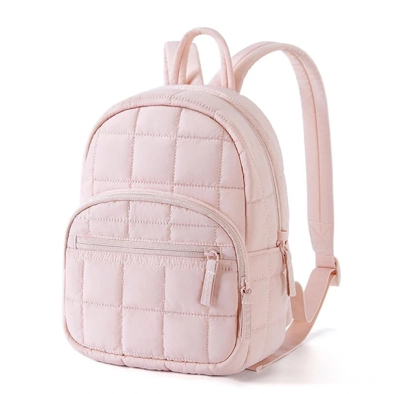 sac à dos college rose rembourré avec poches zippées, présenté sur fond blanc