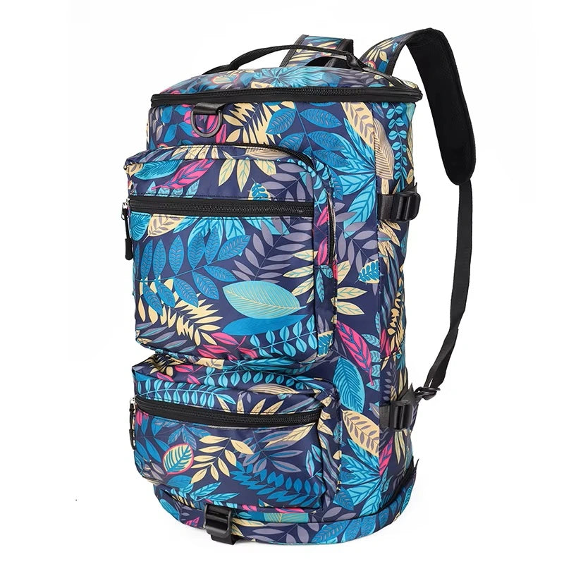 Sac à dos compartiment chaussure avec imprimé feuillage coloré vu en biais, doté de multiples poches zippées pour un rangement optimal