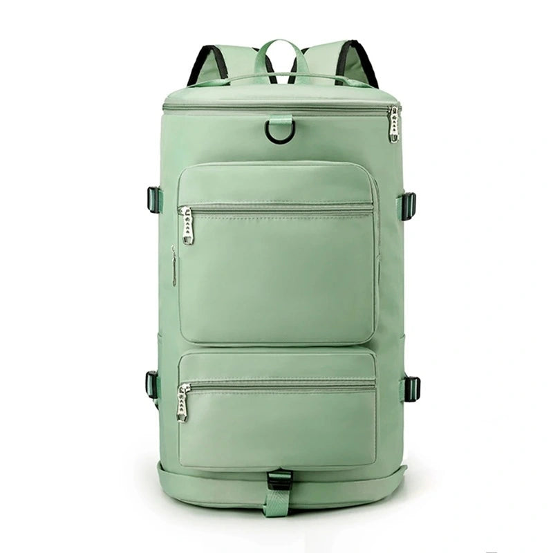 Sac à dos compartiment chaussure vert pastel avec fermetures éclair argentées, présenté en position verticale