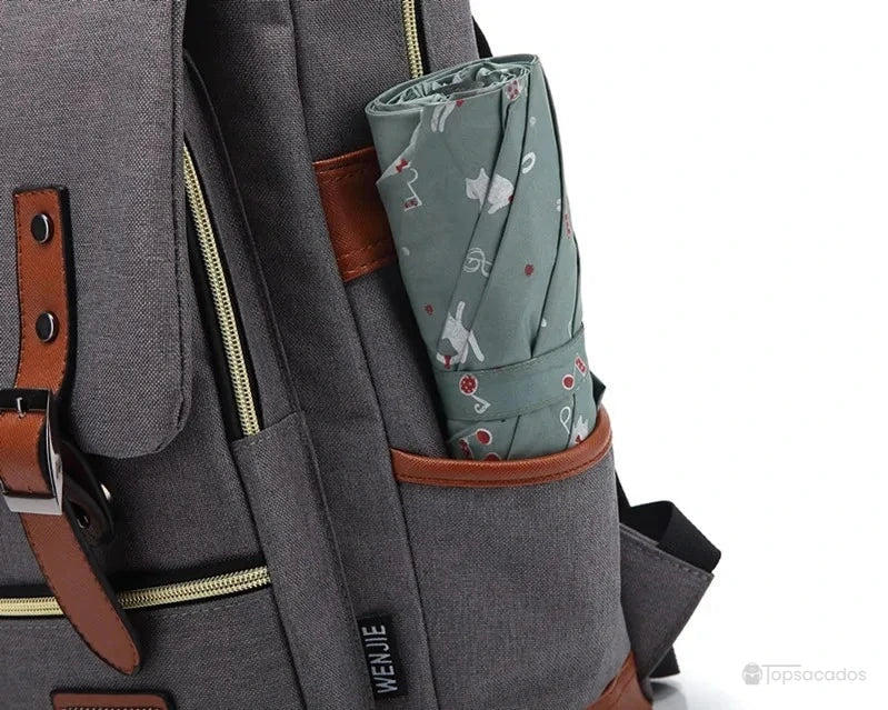 Sac à dos école fille poche latérale contenant un parapluie plié