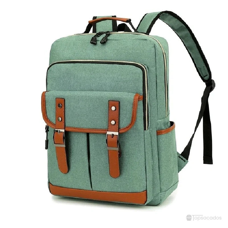 Sac à dos école garçon vert d’eau avec sangles marron, idéal pour la rentrée des classes, isolé sur fond blanc.