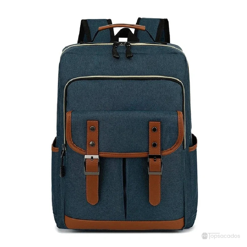 Sac à dos école garçon bleu foncé avec finitions marron, idéal pour un usage scolaire quotidien.
