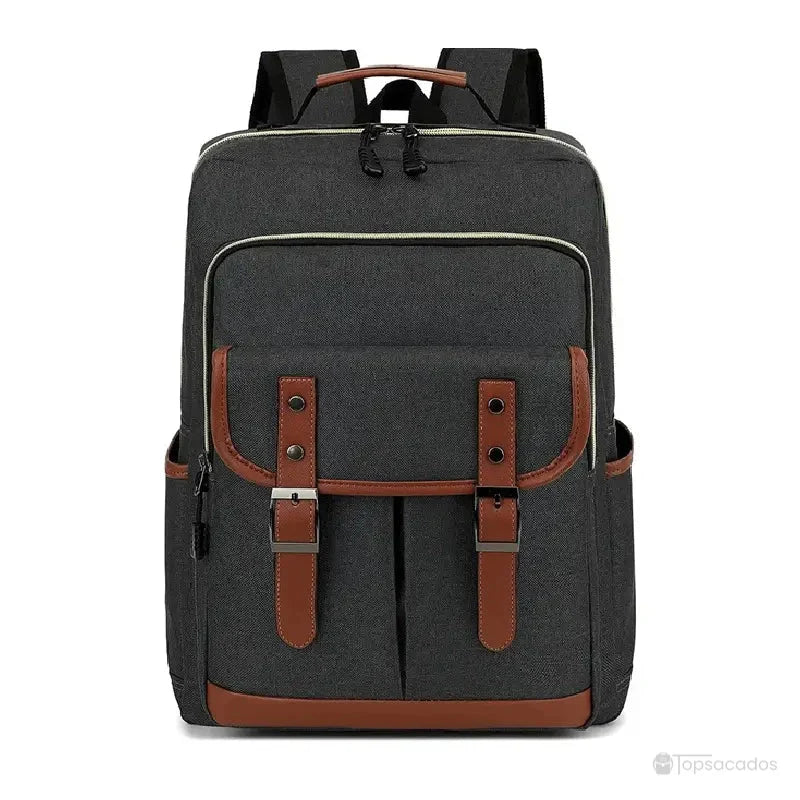 Sac à dos école garçon gris foncé avec liseré beige et détails en cuir synthétique, présenté de face.
