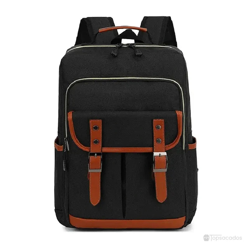 Sac à dos école garçon noir uni avec poches pratiques et sangles marron, parfait pour une tenue sobre.