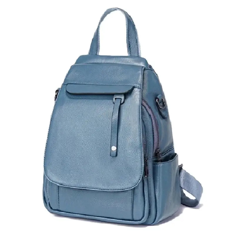 Sac à dos femme élégant en cuir bleu clair avec poche avant à bouton, parfait pour un usage quotidien