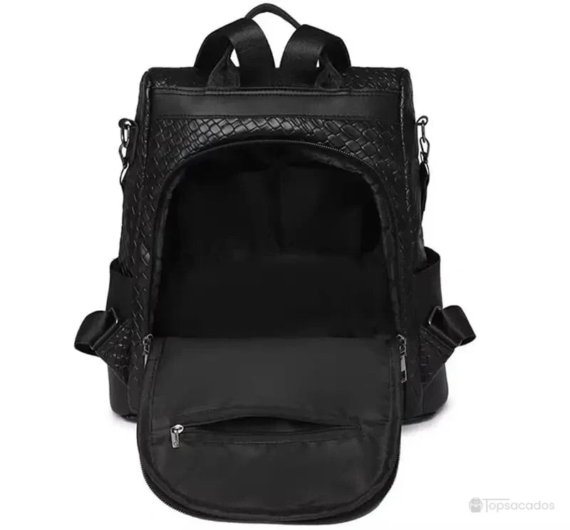 Sac à dos femme noir ouvert, révélant un compartiment principal spacieux avec poche intérieure zippée pour une organisation optimale.