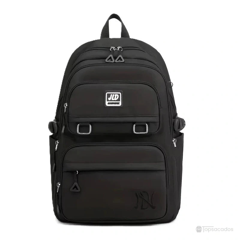 Sac à dos fille noir élégant avec détails argentés et multiples compartiments, photographié de face