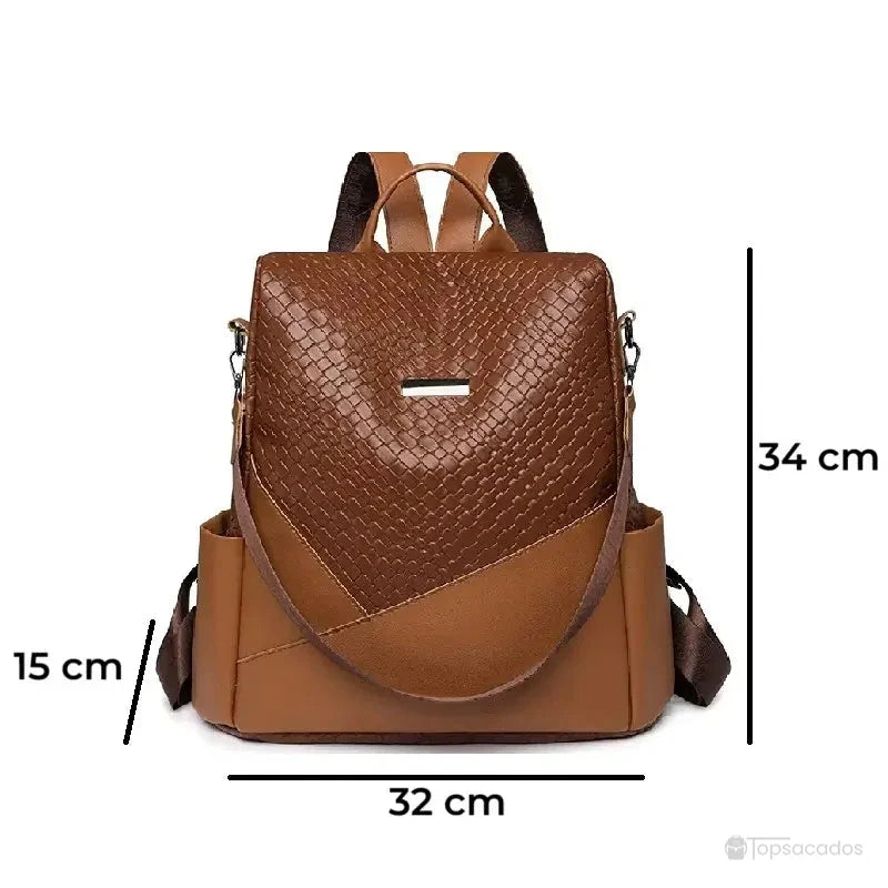 Sac à dos marron Femme présenté avec ses dimensions 34 cm de hauteur, 32 cm de largeur et 15 cm de profondeur, sur fond blanc.