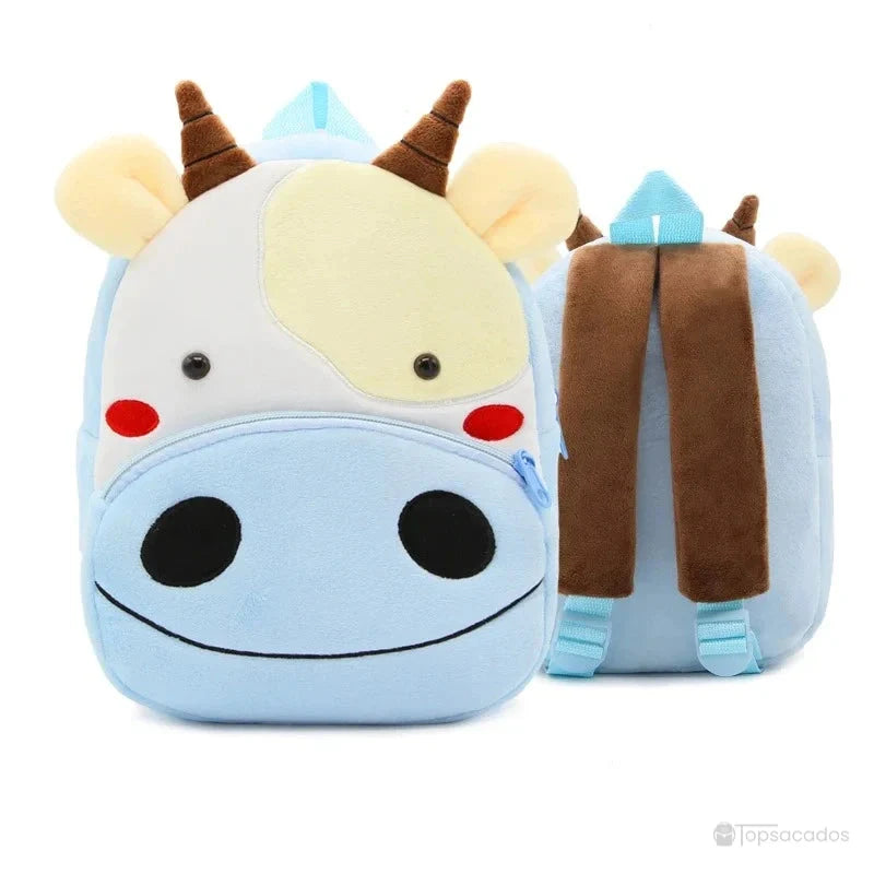 Sac à dos maternelle fille bleu clair en forme de vache avec cornes marron, oreilles crème et grand museau souriant, adapté à l’école maternelle.