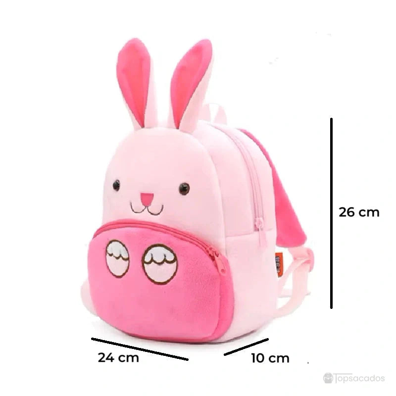 Sac à dos maternelle fille rose en forme de lapin illustré avec dimensions 26x24x10 cm, parfait pour les jouets et goûters.