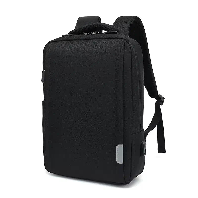 Sac à dos ordinateur Femme en tissu noir uni avec design épuré, port USB latéral et poignées épaisses sur le dessus.