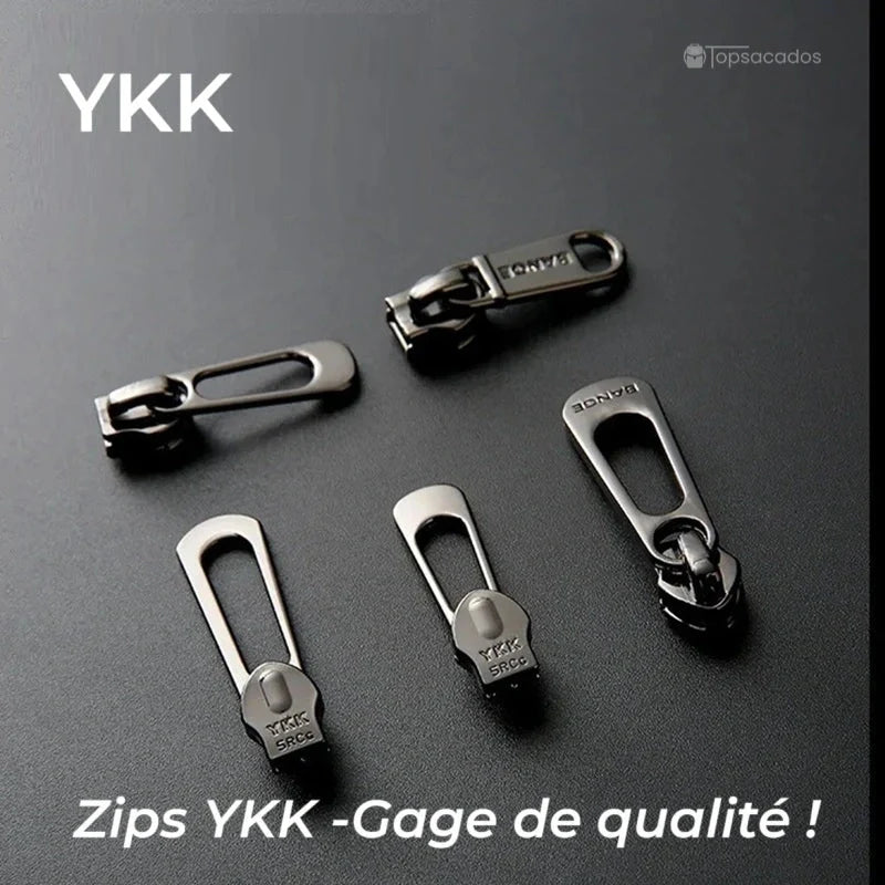 Sac à dos ordinateur portable design avec focus sur cinq fermetures éclair YKK en métal posées sur fond noir, symbole de durabilité.