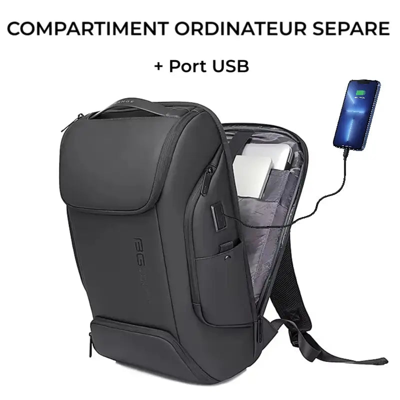 Sac a dos ordinateur portable multipoches ouvert, montrant un compartiment dédié pour ordinateur portable et un port USB connecté à un téléphone en charge.