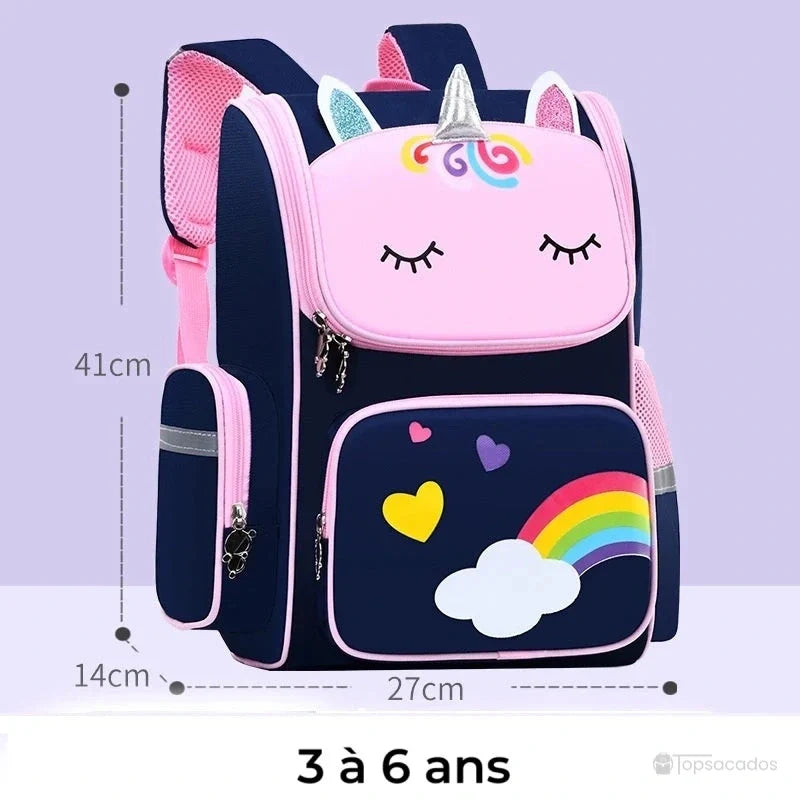sac a dos petite section bleu marine taille 3 à 6 ans avec motif licorne rose, arc-en-ciel et coeurs multicolores, fond violet clair