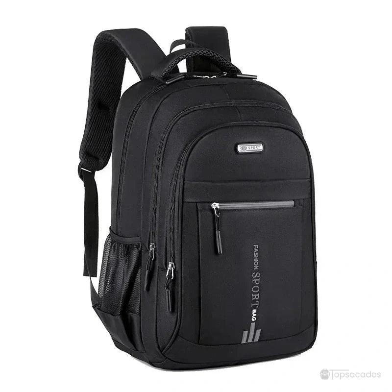 Sac a dos pour cours noir avec détails gris argentés, design sobre et compartiments zippés visibles.