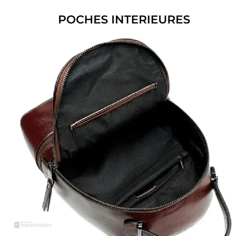 Sac à dos pour femme avec vue sur les poches intérieures, doublure noire avec compartiments zippés pour un rangement optimisé.
