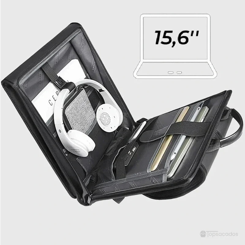 Sac à dos pour PC portable 15.6 pouces ouvert montrant casque audio, tablette, documents et ordinateur portable