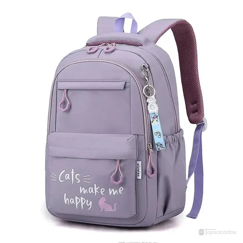 sac a dos primaire violet avec message 'cats make me happy', format enfant, vu de face sur fond blanc