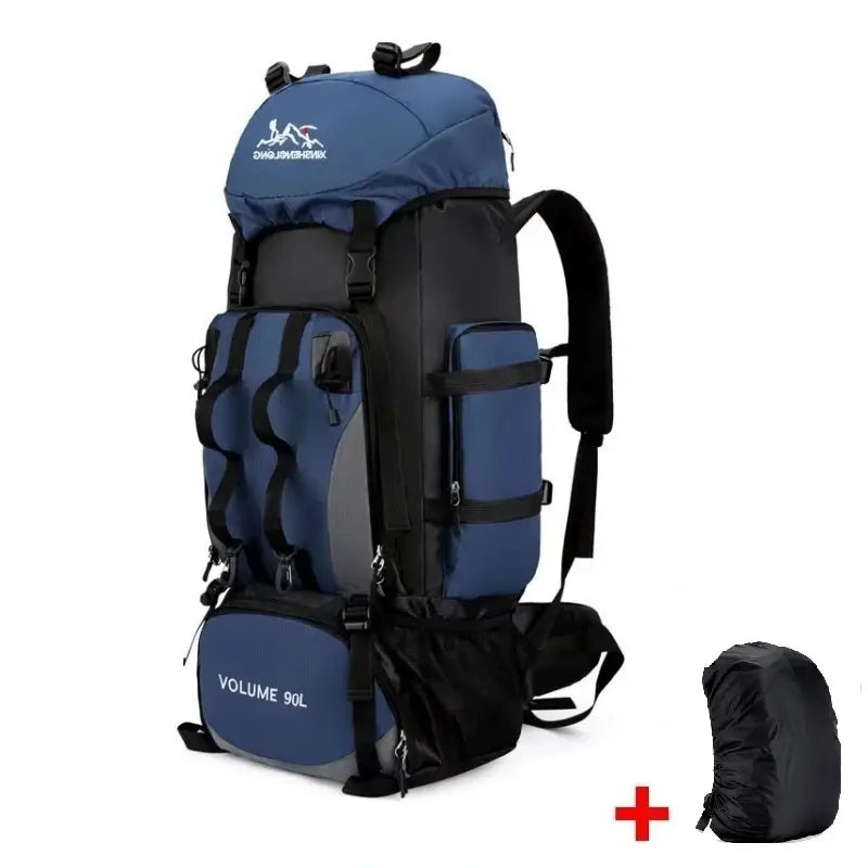 Sac à dos randonnée bleu foncé 90L avec bretelles renforcées et multiples poches latérales pour équipement outdoor.