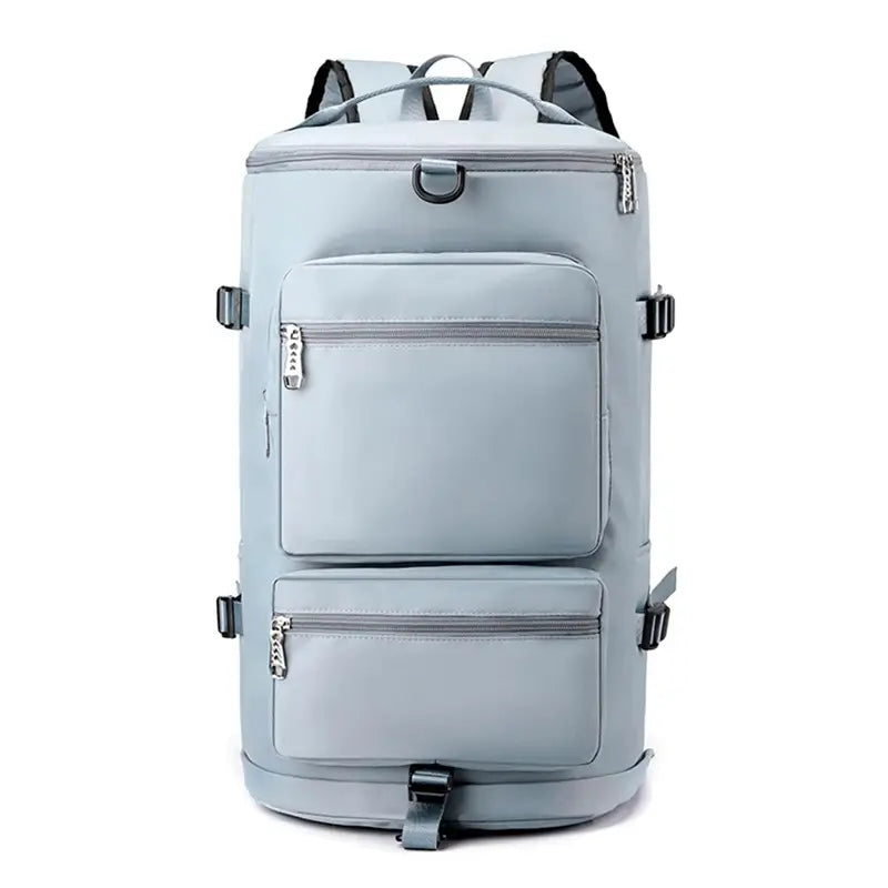 Sac à dos sport grand volume bleu ciel présenté de face avec deux grandes poches zippées et poignée supérieure renforcée.