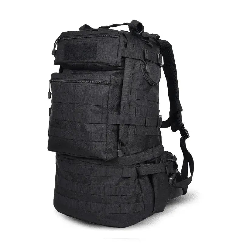 Sac à dos tactique noir entièrement renforcé, conçu pour les missions outdoor avec multiples sangles et poches utilitaires visibles sur fond blanc.