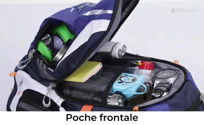 Sac à dos vélo avec poche à eau ouvert sur une grande poche frontale remplie d'accessoires de randonnée.