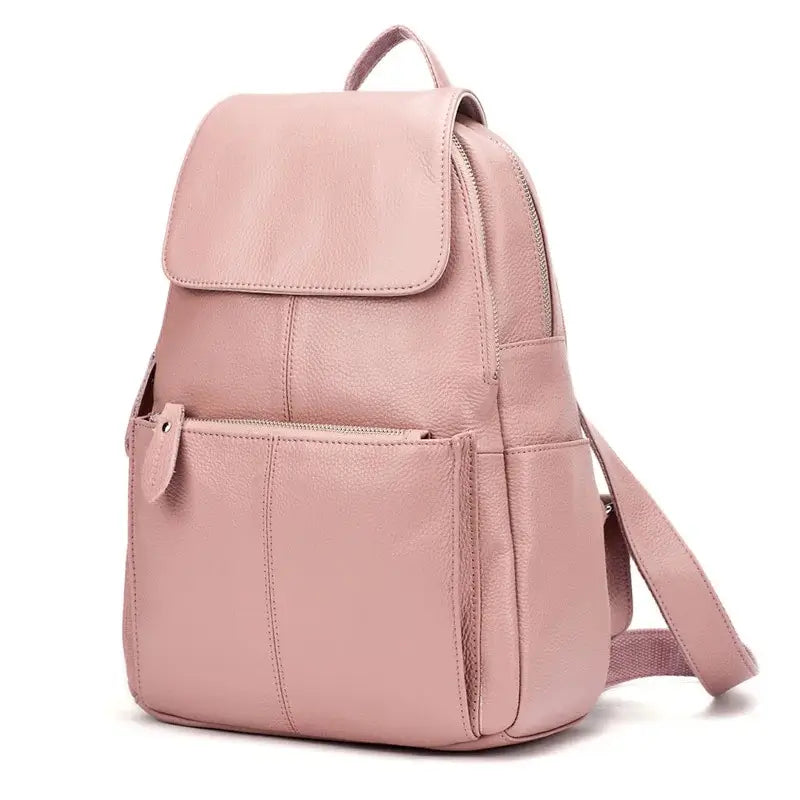 sac à dos ville femme rose mauve en cuir texturé, avec poche frontale zippée et bretelles assorties sur fond blanc