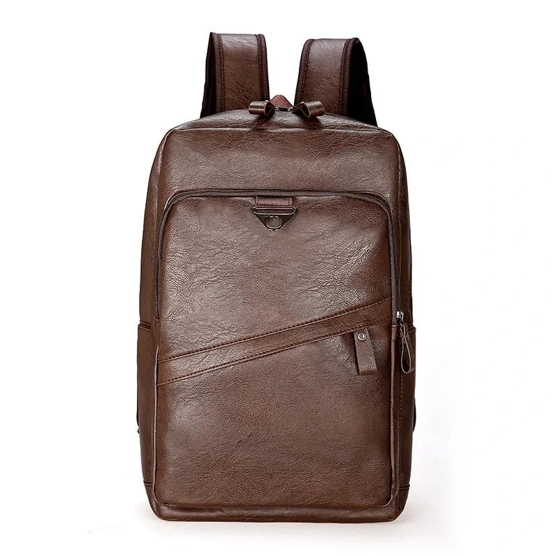 Sac à dos ville homme en simili cuir marron foncé, design sobre et compartiment frontal zippé.
